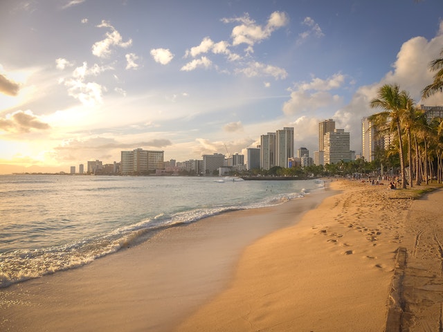 honolulu beach with a city the background